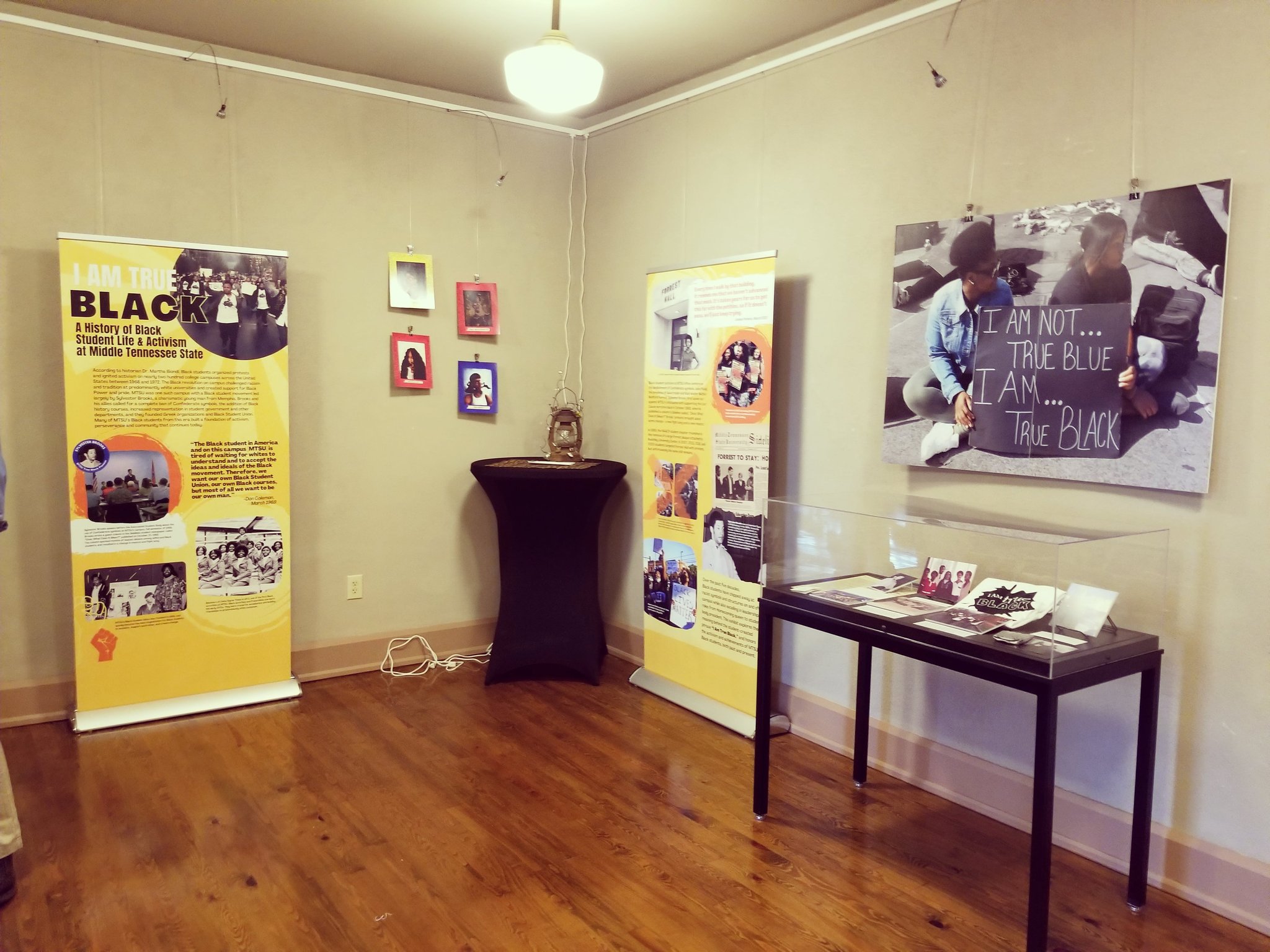 Two exhibit panels and a small display case